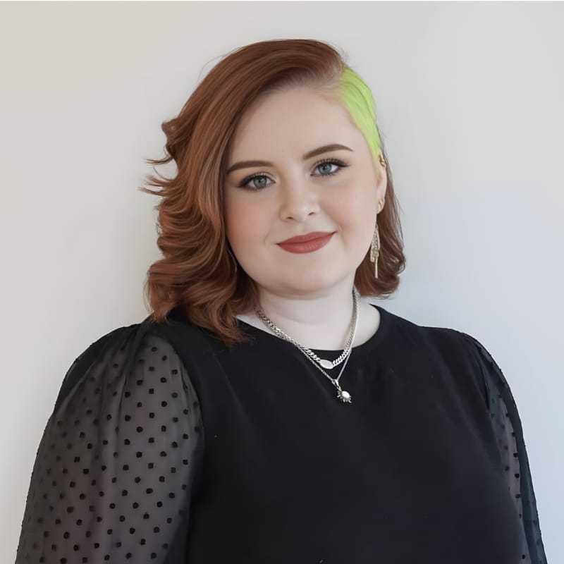 Portrait of Rebekah S., a professional stylist at Mouton's Salon, showcasing their expertise and style.